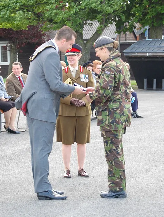 A presentation, watched by an officer
